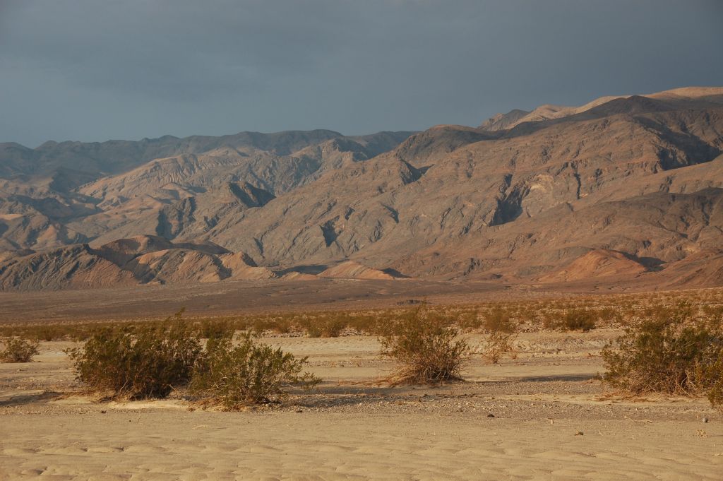 Our next objective was to continue hiking toward the very small hillside or outcropping in the lower center of the picture.  The western wall towering above Slab Canyon can be seen on the right side: